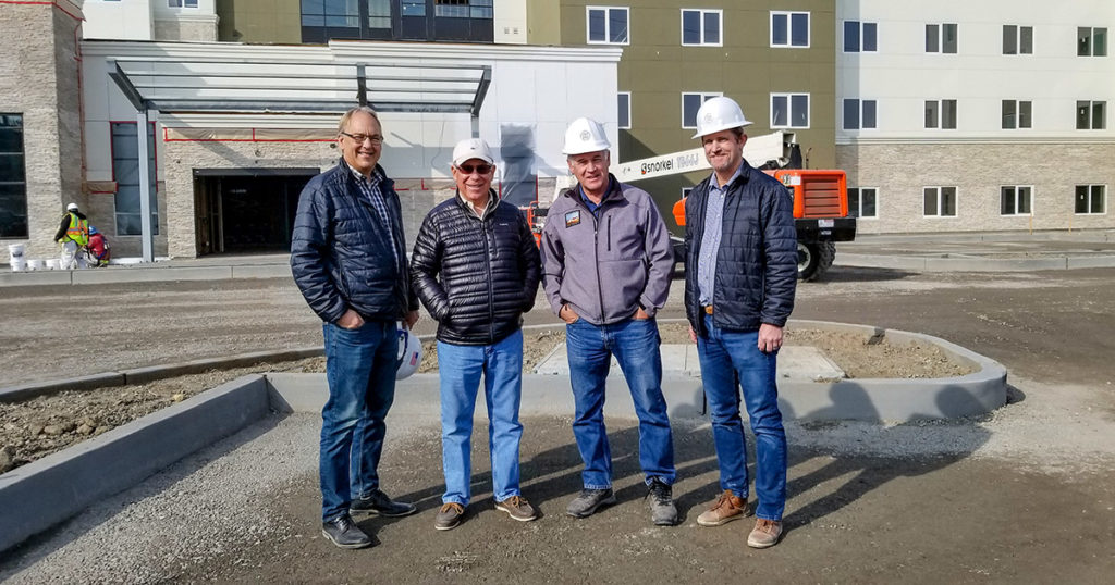 From left to right: Gary Huff (CEO), Duane Huff (Founder), Dave Royalty (Retired Superintendent), Larry Nelson (Project Manager)